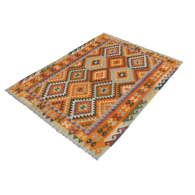 Add a touch of elegance to your home with this casual chic hand woven Tribal Kilim wool rug. Constructed on a loom by...