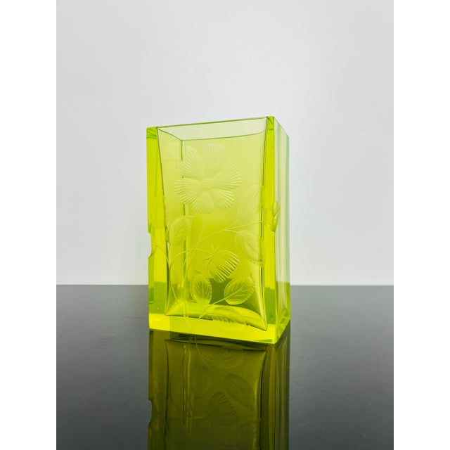 Signed Moser Karlsbad uranium glass vase with finely hand-engraved floral decoration. The substantial geometric form is...