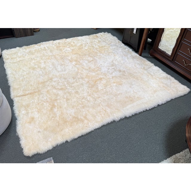 Design Plus Gallery presents a 7ft 10in x 7ft 10in Sheepskin Area Rug from Safavieh. This 100% sheepskin area rug has a...