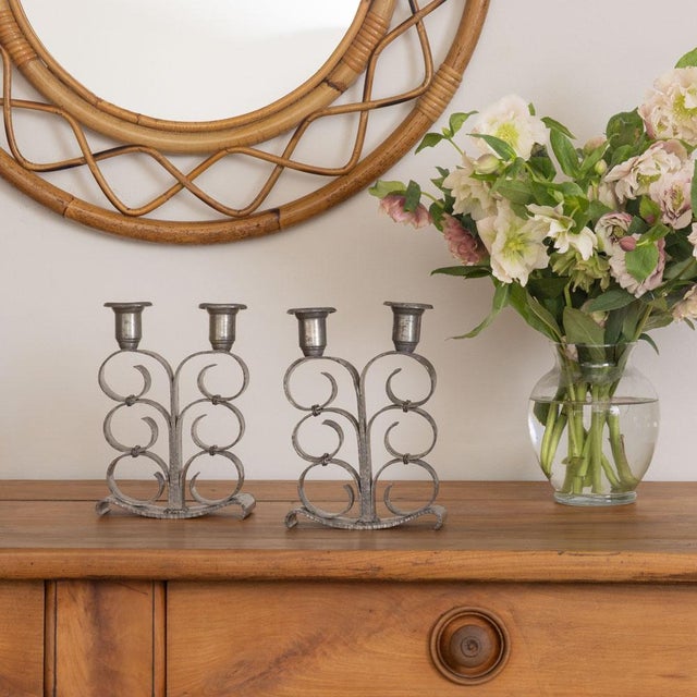 Pair of pewter scroll candlesticks from France, 1940s. Beautiful pewter candlesticks with scroll detail and solid pewter...