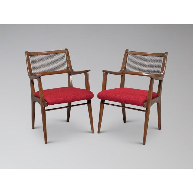 This vintage set of 6 spindle back dining chairs was designed by John Van Koert for Drexel's "Profile" line of furniture...