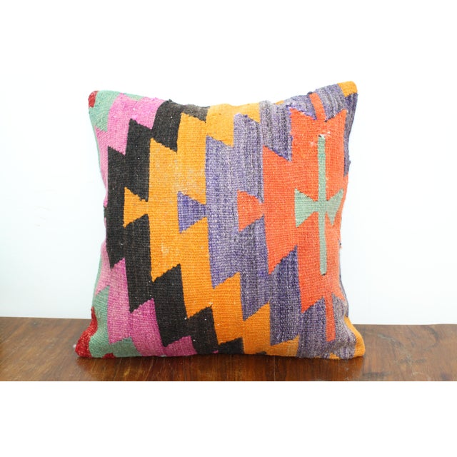 This Turkish pillow cover is made from the highest quality vintage Kilim in 100% wool on the front. The back is covered in...