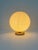 Precious peonia t 25 table lamp by la murrina murano. The cased glass has a refined cream-colored base and a white...