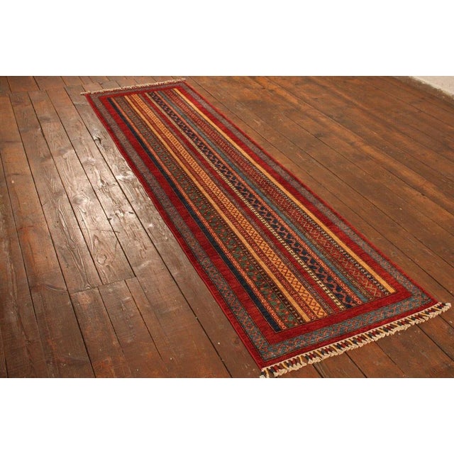 Hand-knotted oriental rug | size: 292cm x 81cm | knot density: approx. 160,000 knots/m² | material: 100% wool (pile) and...