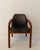 This elegant Mid-Century Modern armchair was produced in Germany during the 1960s and showcases the clean lines and...