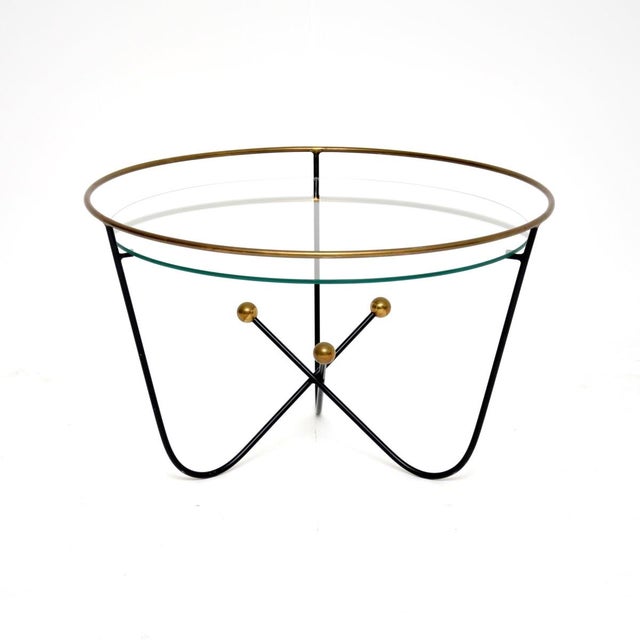 A stylish and iconic vintage steel and brass coffee table by Edward Ihnatowicz. This was made by Mars furniture and was...