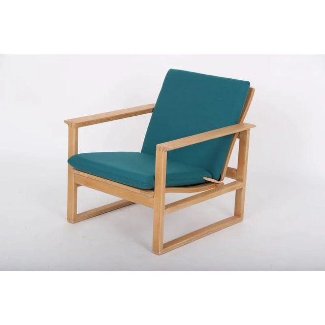 Børge Mogensen chair with runners, model 2256. Made by Fredericia Furniture. Renovated. Oak soaped and new cushions with...