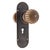 Vintage fluted passage door knob set made of bronze with a button center. The back plate is made by Reading Hardware....