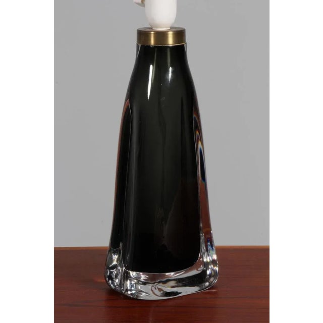 Carl Fagerlund table lamp in glass Made by Orrefors. This piece is attributed to the mentioned designer/maker. It has no...