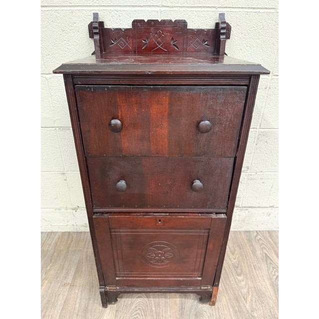 This is a beautiful antique Victorian Eastlake Aesthetic Movement bedside cabinet featuring two drawers over a lower...