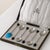 This elegant Art Deco set is a collector's item crafted by Elkington & Co., one of the UK's leading silversmiths, renowned...