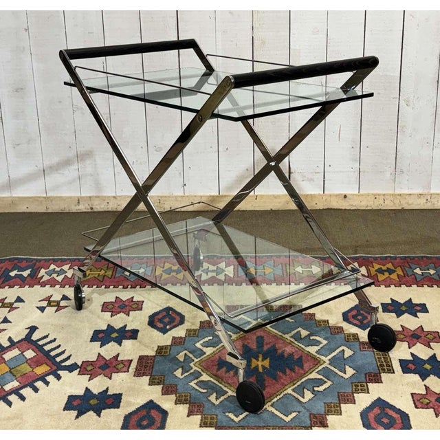 Rolling table in transparent glass from the 90s in polished stainless steel and wenge-stained oak handles - in the style...