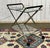 Rolling table in transparent glass from the 90s in polished stainless steel and wenge-stained oak handles - in the style...