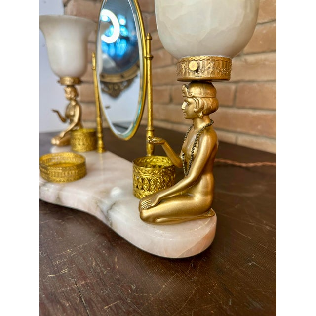 This striking piece is a classic Art Deco vanity/dressing table lamp and plateau set, likely dating from the late 1920s to...