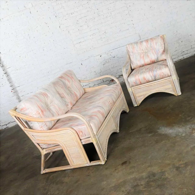 Wonderful cerused reeded rattan lounge chair and love seat with removeable cushions. Beautiful condition, keeping in mind...