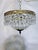 This is very decorative basket chandelier with decorative brass frame and A-chain and Plug crystals. Rewired and restored...
