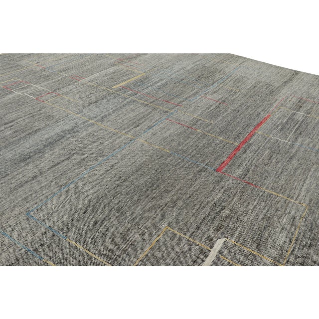 Made with handwoven wool, this 13x15 contemporary Kilim is a bold and exciting new addition to both the KIlim & Flat Weave...