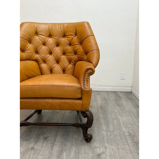 Beautiful pair of chesterfield style leather wingback chairs in good condition