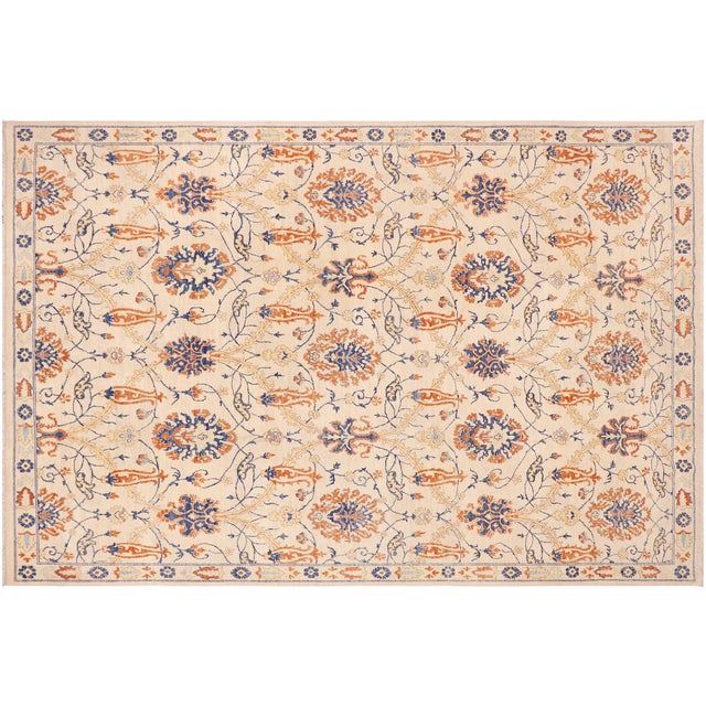 Brimming with a chic contemporary design off set by intricate motives, this lustrous hand knotted rug made with hand-spun,...