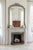 An attractive turn-of-the-century french rococo-inspired overmantel mirror, dating to circa 1900. This elegant piece...