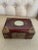 Vintage rosewood jewelry box with brass and jade detailing galore. The body of this piece is stunning - a warm medium wood...