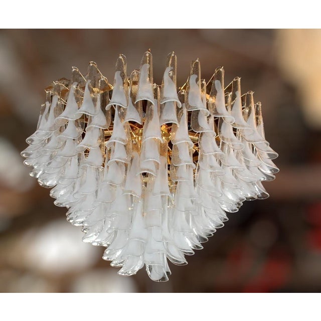 Italian chandelier shown with clear and light milky white Murano glass petals mounted on 24 k gold finish frame / Designed...