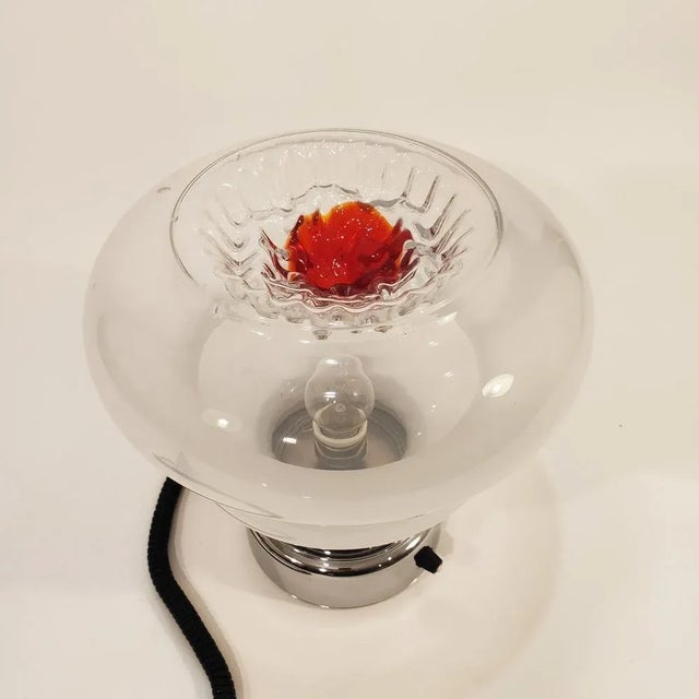 Italian desktop lamp of the 70s, in the style of the artistic creations of Toni Zuccheri. Murano crystal tulip of organic...