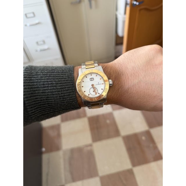 Early 20th Century Corum Romulus 18k Rose Gold 2-Tone Champagne White Dial 42mm Watch Full Set For Sale - Image 12 of 12