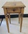 A Contemporary single drawer antiqued painted decorated side table or floor candle stand or plant stand. Measures 15" in...