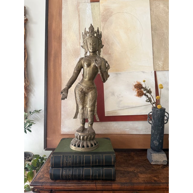 A striking large-scale brass sculpture of Shiva, one of the principal deities in Hinduism, known as the god of...