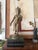 A striking large-scale brass sculpture of Shiva, one of the principal deities in Hinduism, known as the god of...
