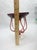 Striking mid-century modern art glass compote featuring a deep cranberry-to-ruby red bowl cradled by an elaborate,...