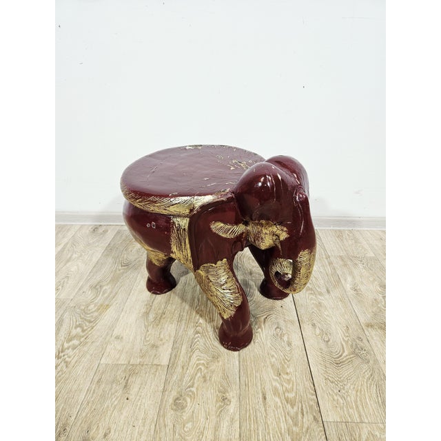 We present an exceptionally rare, collectible side table (or stool) shaped like a majestic elephant. This is an authentic...