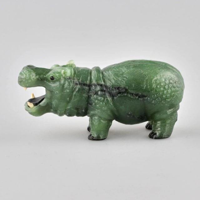 Jade stone-cut miniature "Behemoth". The finely executed figurine depicts a standing hippopotamus with an open mouth. The...