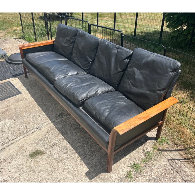 Vintage four-seat sofa by Knut Saeter for Vatne Mobler. This sofa has was purchased in Washington DC in the 1960’s and has...