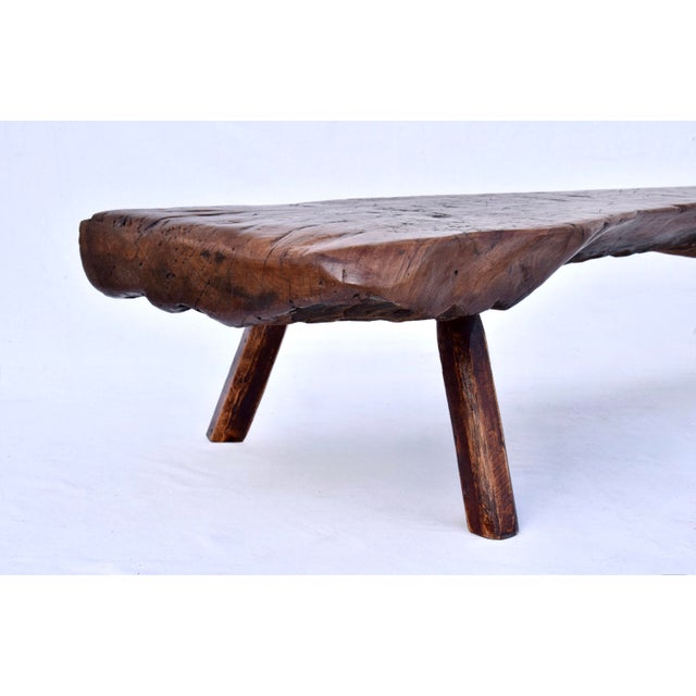 A fabulous Antique pig bench table with thick single Black Walnut slab top, beautiful time worn patina and splayed mortis...
