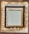 This ornate Rococo Baroque style wall mirror features a beautiful deeply carved floral rose and foliate motif finished in...