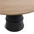 Round elm and pine wood dining table which balances warm natural texture with bold architectural form. The natural elm top...