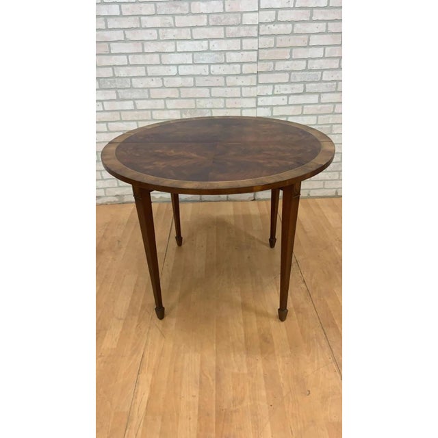 Vintage Inlay Flame Mahogany Table with Folding Demi Lune Console This table features a stunning inlay design crafted from...