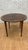 Vintage Inlay Flame Mahogany Table with Folding Demi Lune Console This table features a stunning inlay design crafted from...