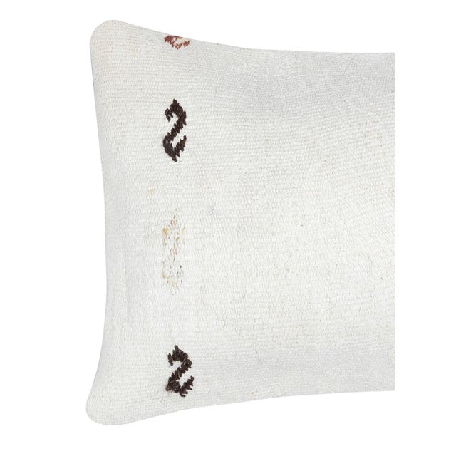 Add a touch of history and warmth to your space with this vintage handmade Turkish hemp kilim cushion cover. Crafted from...