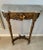 19th Century French Louis XVI Giltwood Marble Top Console Table is petite in size. Flowers, leaves and berries surround a...