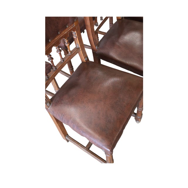 Immerse yourself in the grandeur of medieval craftsmanship with this stunning set of six Henry II chairs, a perfect...