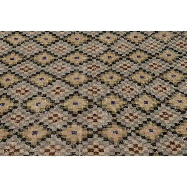 Made with hand-knotted wool and originating circa 1950-1960, this 5x8 vintage rug is an exciting new piece in Rug &...