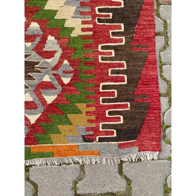 Size: 2 x 2.7 ft ( 62 x 84 cm ) 24.4 x 33 inches Colour: Red, Green, Gray, Orange, Beige Material: %100 Wool All rugs are...