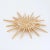 Vintage Chanel Large Starburst crystal brooch (circa 2001) crafted in yellow gold tone. Small crystals are set into the...
