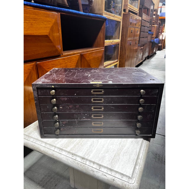 Antique metal watchmaker’s cabinet or storage with six drawers. By E & J Swigart Co. This is a lot of (4) metal drawer...