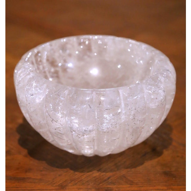 Hand carved in Brazil, this elegant rock crystal bowl features a deep circular form surrounded by a sculptural scalloped...