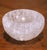Hand carved in Brazil, this elegant rock crystal bowl features a deep circular form surrounded by a sculptural scalloped...
