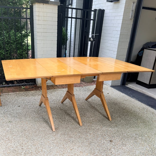 Mid Century Modern Drop Leaf Dining Table & 4 Chairs Believed to be unmarked Heywood-Wakefield, this vintage table and...